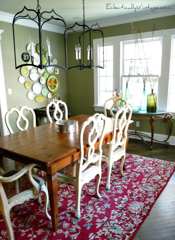 Dining Room - love the mix of collections and furniture (and that plate wall)!  kellyelko.com