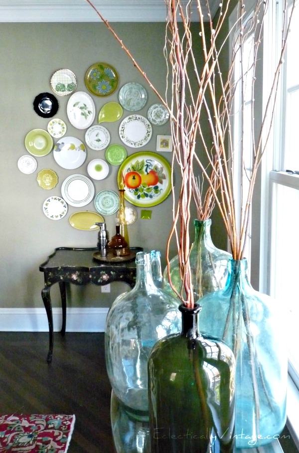 Eclectic plate wall - you have to see this dining room!  kellyelko.com