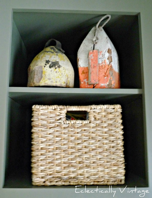 Vintage buoy collection in this gorgeous mudroom kellyelko.com