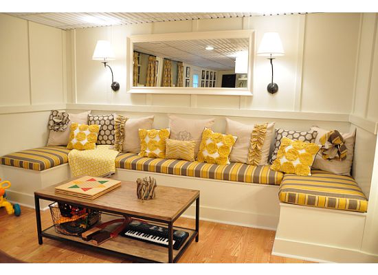 Stylish basement renovation - from the built in seating to the color choices