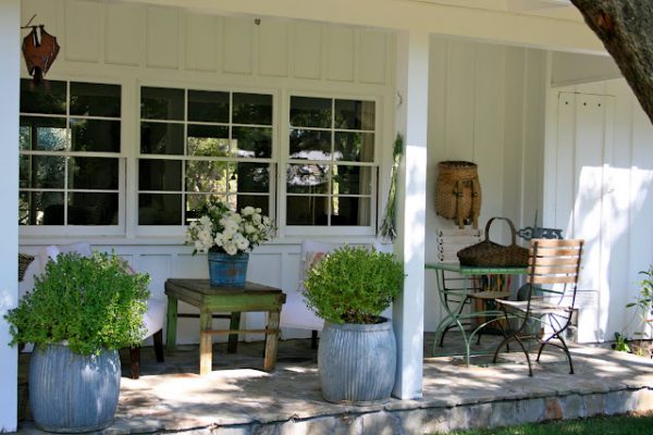 Vintage filled porch - I want to sit a spell!