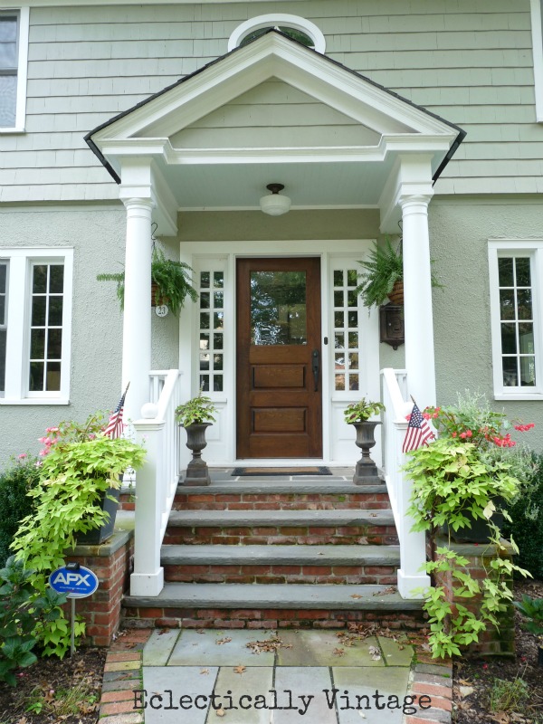 Welcoming Front Porch - ferns and coleus (and lots of other creative gardening ideas here)  kellyelko.com