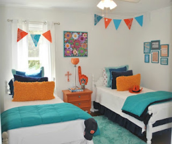 Bold boys bedroom - love the banners!