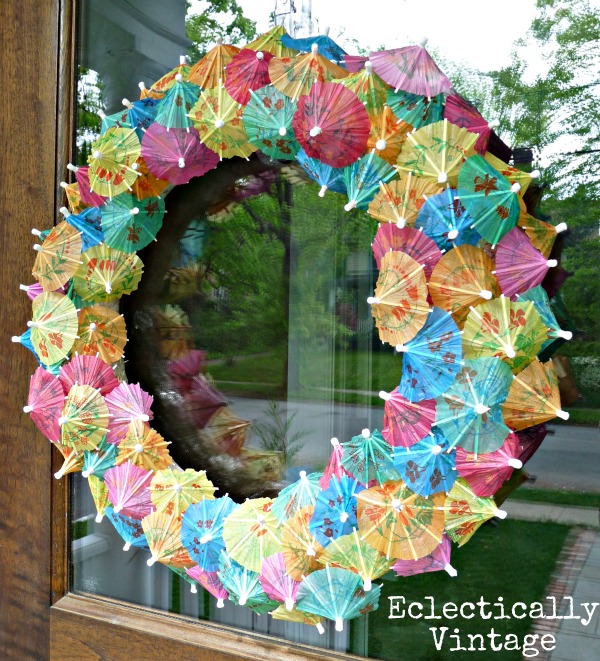 Make a Paper Parasol Wreath - how fun!  kellyelko.com