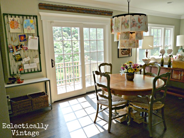 Kitchen nook - love the map chandelier!  kellyelko.com