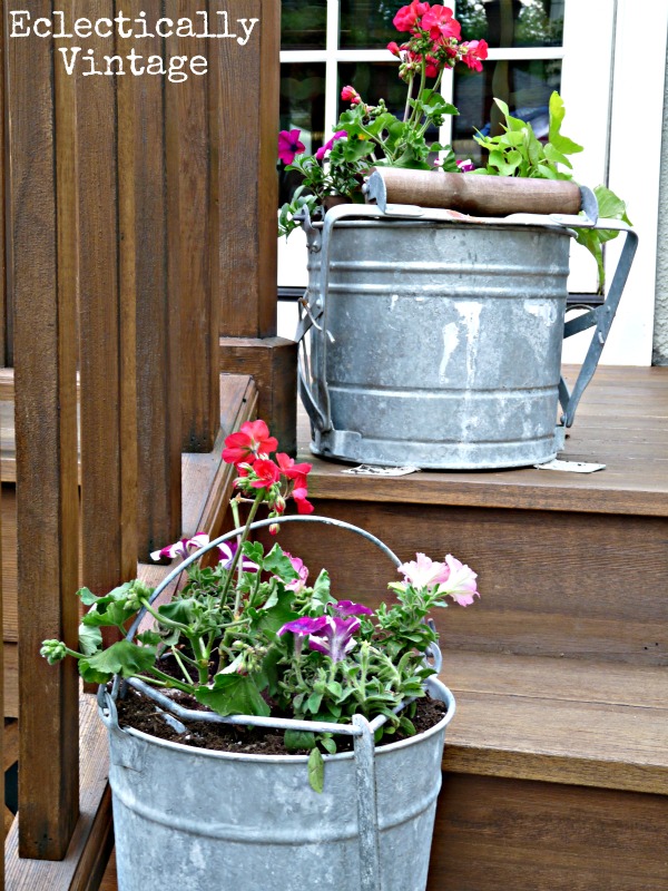 Love these vintage mop bucket planters kellyelko.com