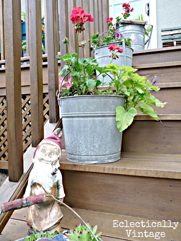 Love these vintage mop bucket planters and galvanized tubs kellyelko.com