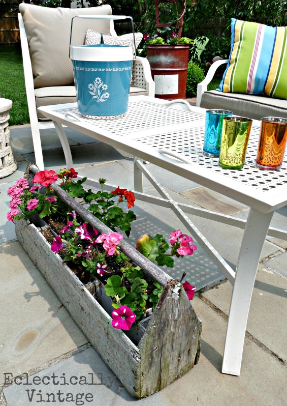 Eclectic patio - love the mixture of new and vintage pieces and the creative planters!  kellyelko.com