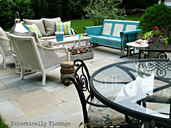 Eclectic patio - love the mixture of new and vintage pieces and the creative planters!  kellyelko.com