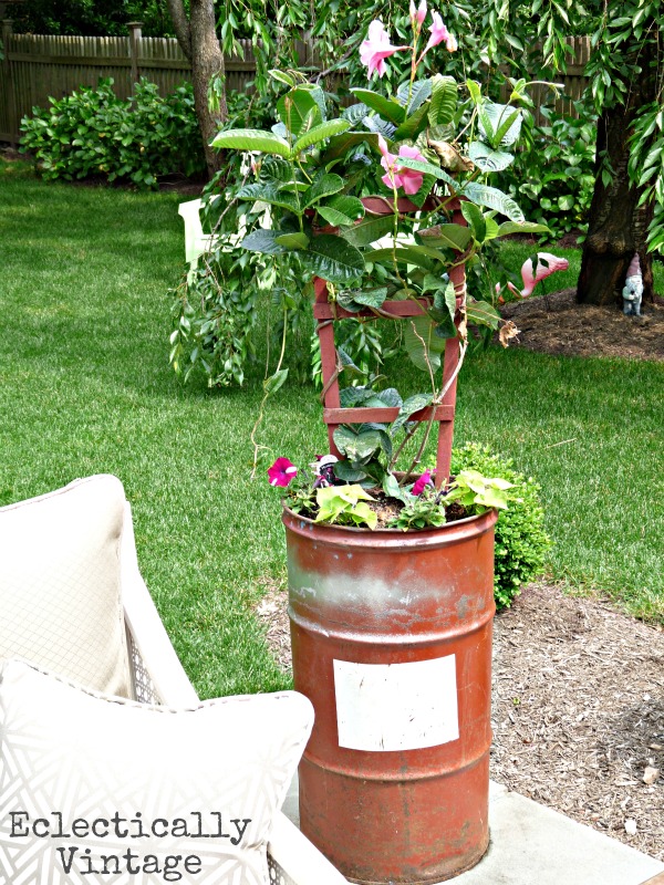 Eclectic patio - love the mixture of new and vintage pieces and the creative planters!  kellyelko.com