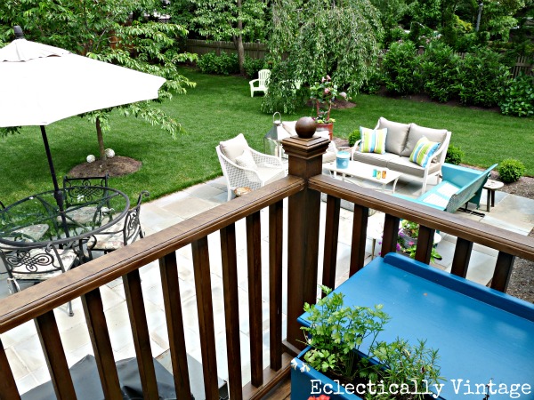 Eclectic patio - love the mixture of new and vintage pieces and the creative planters!  kellyelko.com