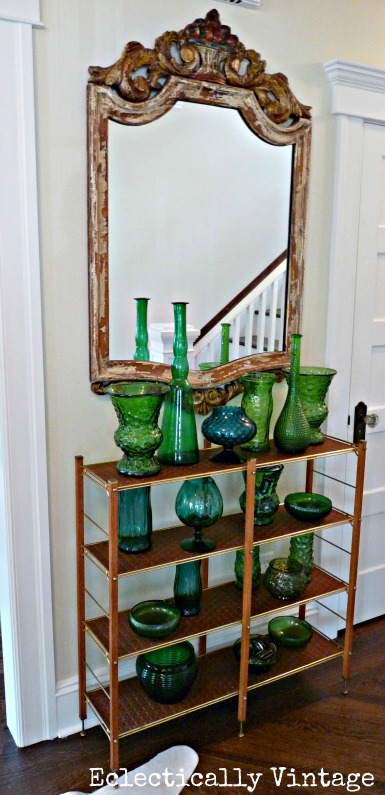 Amazing vintage green glass collection in this beautiful entryway - kellyelko.com