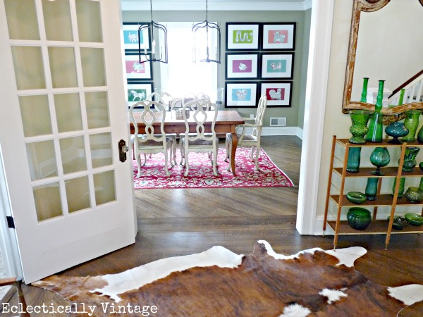 Gorgeous foyer leading into colorful dining room - kellyelko.com