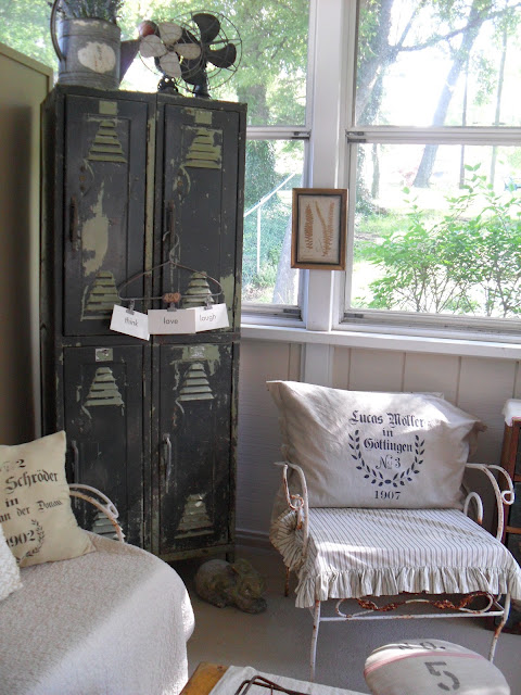 Love this sunroom and the old locker! kellyelko.com