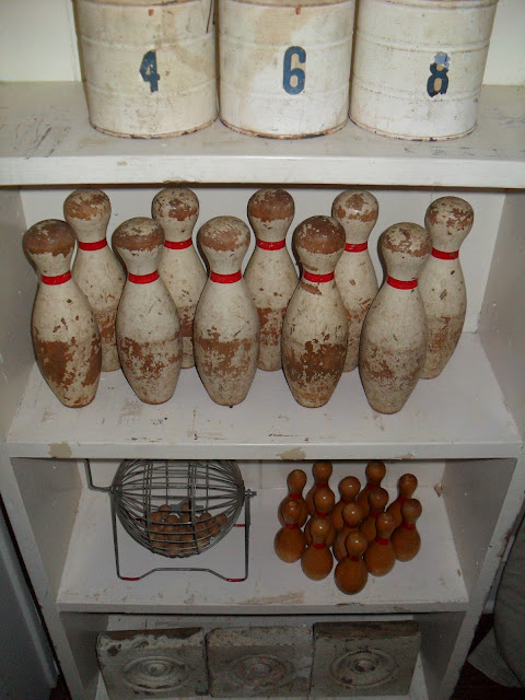 Old bowling bowl collection - one of the many cool displays in this home tour kellyelko.com