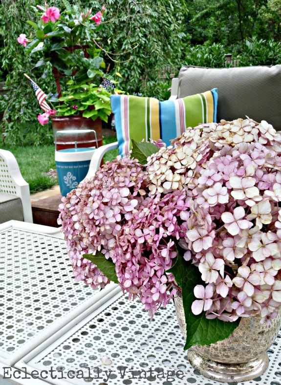 Beautiful patio furniture - love the hydrangeas too kellyelko.com