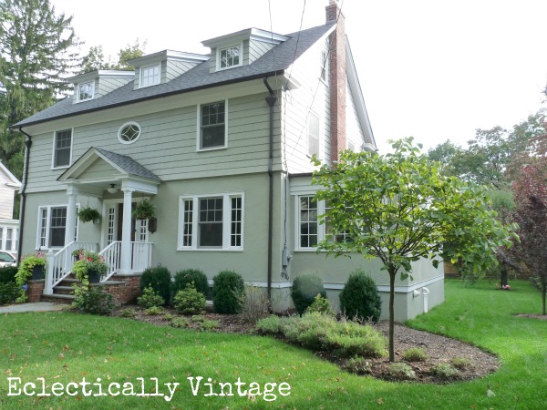 Love the curb appeal of this old house - the dormers, the porch, the railings, the windows! kellyelko.com