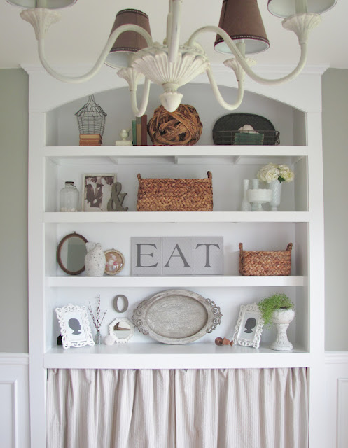 Dining room hutch - love the collections and neutral decor kellyelko.com