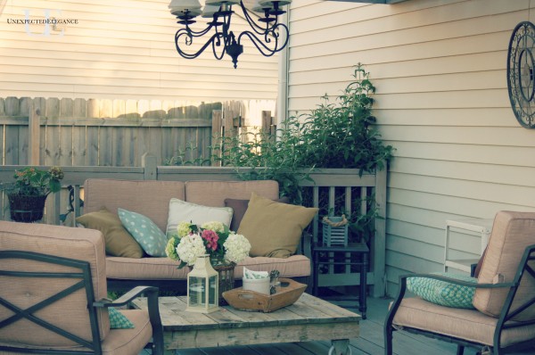 Farmhouse Industrial House Tour - the perfect mix.  Including the perfect patio with a DIY pallet coffee table..