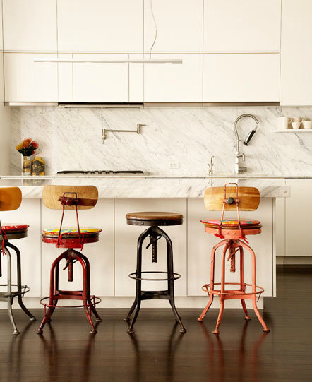 Kitchen renovation ideas - love the use of mismatched vintage stools! 
