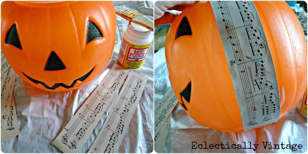 DIY Halloween music sheet planter from a plastic pumpkin!  Perfect fall decorations at kellyelko.com