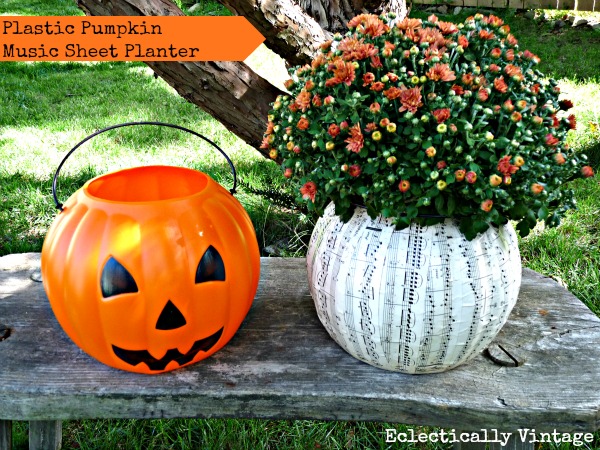DIY Halloween music sheet planter from a plastic pumpkin!  Perfect fall decorations at kellyelko.com