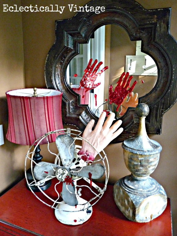 Gory Halloween Decorating Ideas - poor fellow lost his hand!  kellyelko.com