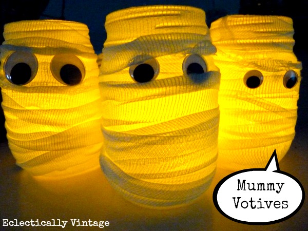 Halloween House Tour - tons of creative #Halloween decorations like these DIY #mummy votives!  kellyelko.com