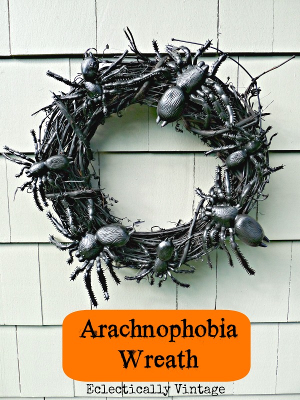 Halloween House Tour - tons of creative #Halloween decorations like this DIY spider wreath!  kellyelko.com