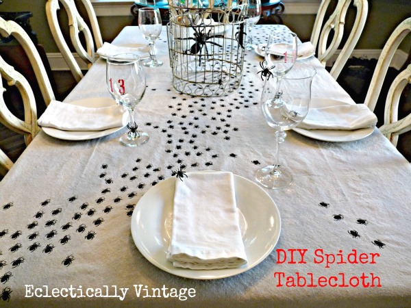 Halloween House Tour - tons of creative #Halloween decorations like this DIY spider tablecloth!  kellyelko.com