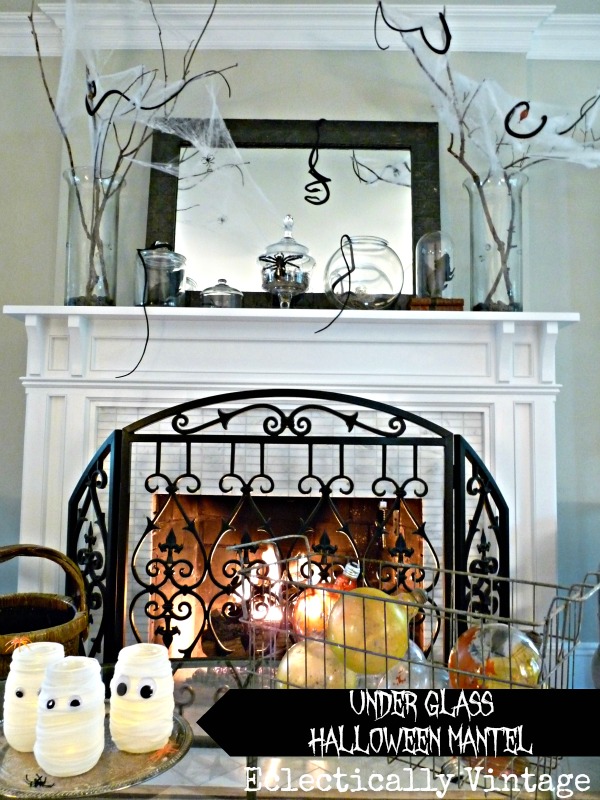 Under Glass Halloween Mantel Ideas - this is creepy crawly!  kellyelko.com