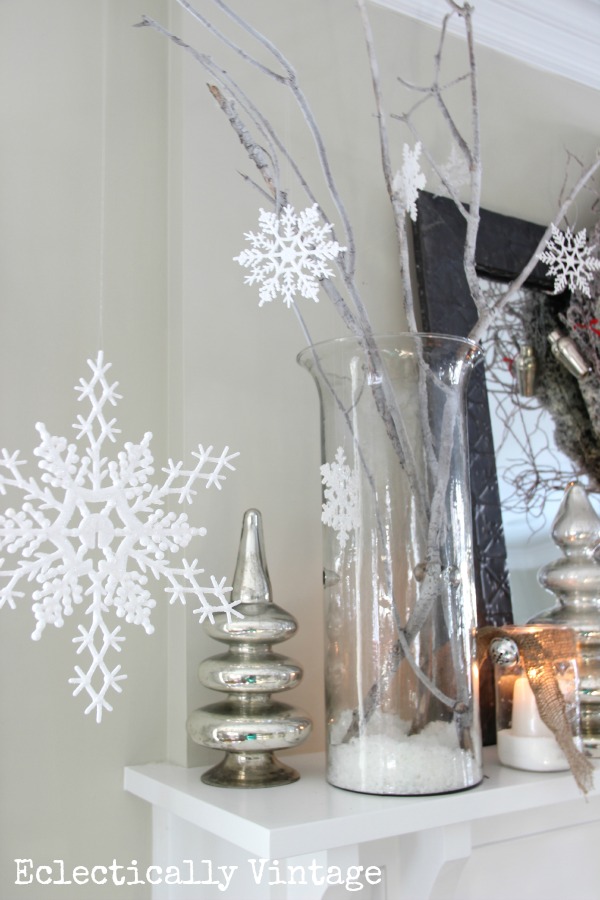 Christmas House Tours - step inside this 100 year old home filled with tons of fabulous decorating ideas like these snowflakes!  kellyelko.com