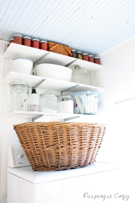 Organized Laundry Room - great open shelves and love the blue ceiling