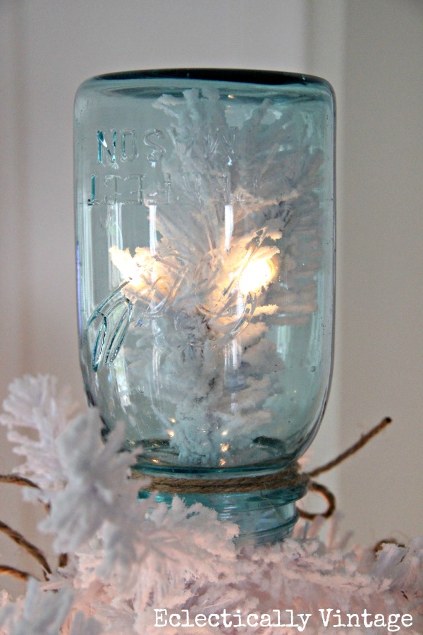 Christmas House Tours - step inside this 100 year old home filled with tons of fabulous decorating ideas like this mason jar tree topper!  kellyelko.com