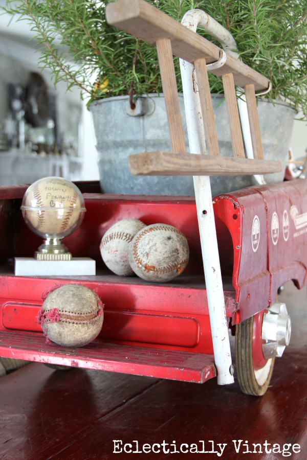 Christmas House Tours - step inside this 100 year old home filled with tons of fabulous decorating ideas like this vintage fire truck!  kellyelko.com