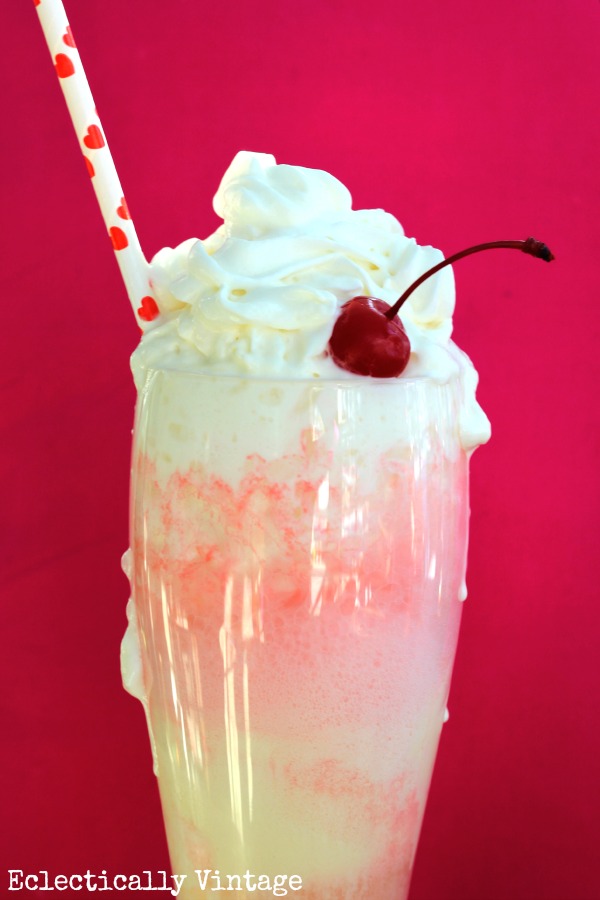 Cupid Float Valentine Drink - perfect for the kids! kellyelko.com #valentine #valentinesrecipe #valentinesday #valentinesparty #kidsvalentine #kidsdrinks #kidsrecipes #recipes #cupidfloat