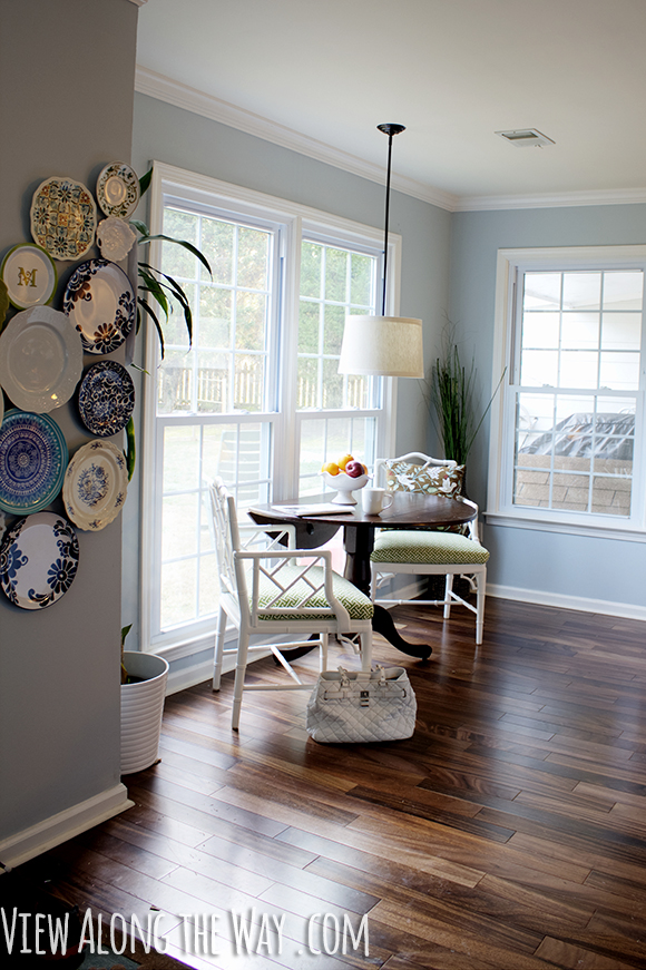 Breakfast nook with DIY wrap around the wall plate wall - plus a great house tour!