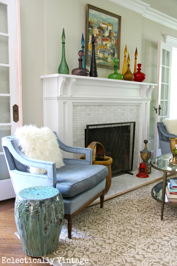 Eclectic living room - love that vintage landscape gallery wall