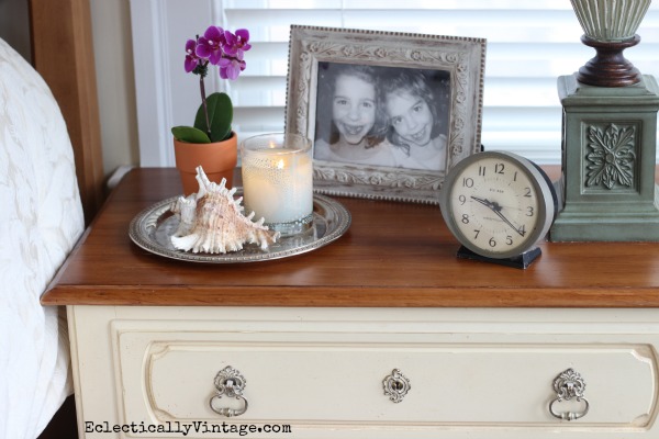 Nightstand decor - I love a tray to corral everything.  kellyelko.com