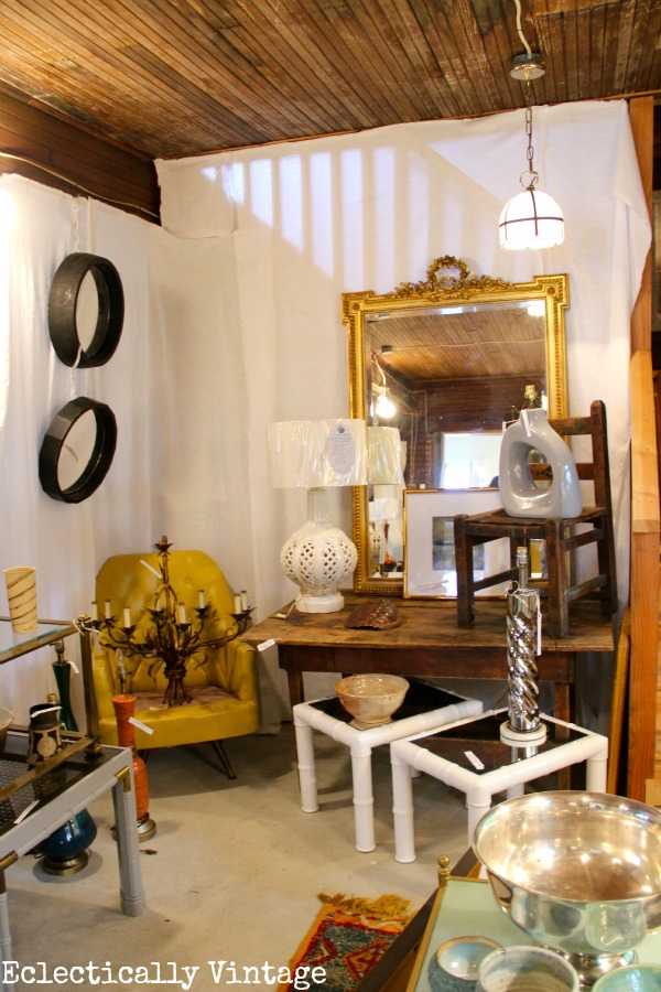 See how to throw a chic garage sale - tons of pics from farmhouse to mid century modern!  kellyelko.com