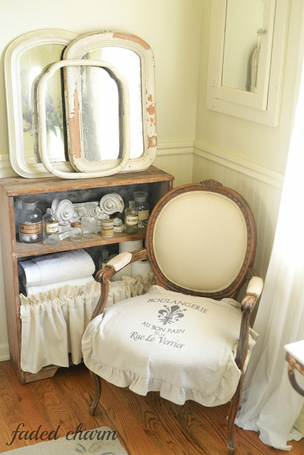 Cottage bathroom - love the mirror collection