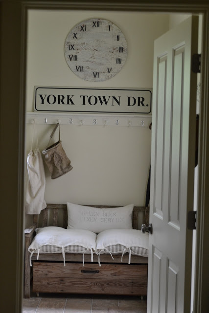 Beautiful mudroom - love the clock