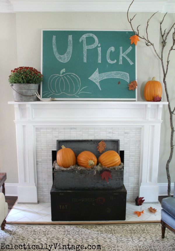 Fall mantel decor - love the giant chalkboard, pumpkins and huge branch kellyelko.com