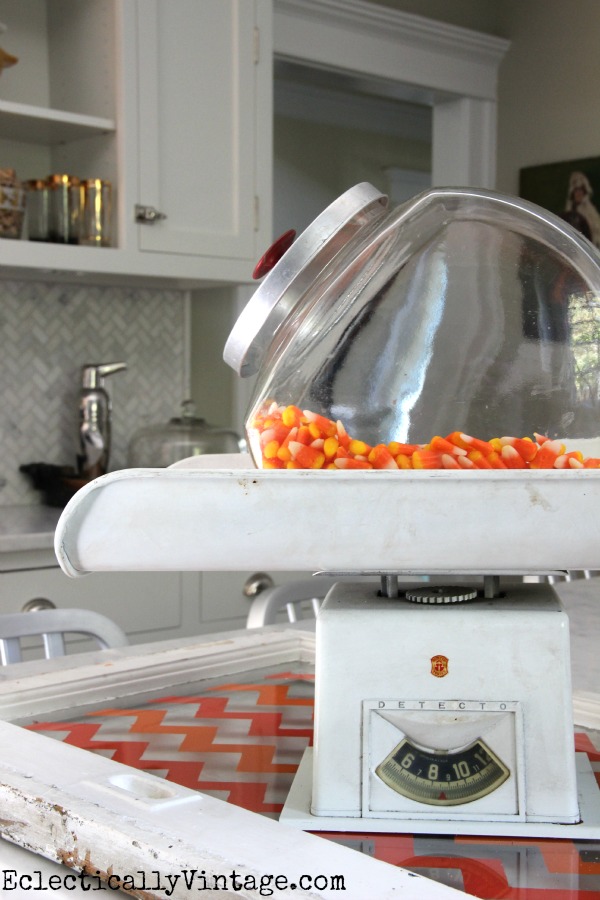 Vintage candy jar on an old scale - love this kitchen!  kellyelko.com