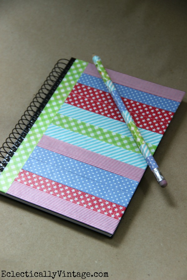 Washi Tape is perfect for dressing up boring notebooks!  One of 5 fun decorative tape ideas at kellyelko.com