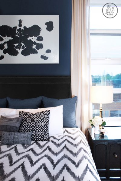 Beautiful master bedroom - love the DIY artwork kellyelko.com