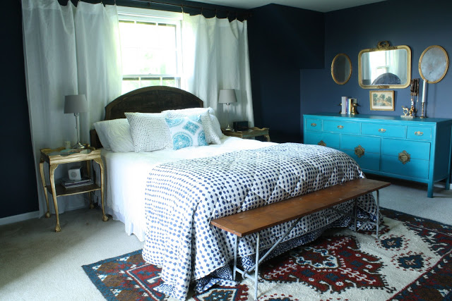 Dramatic master bedroom - love the bold color