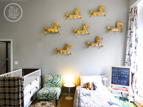 What a fun wall treatment - 3d golden ponies!  kellyelko.com