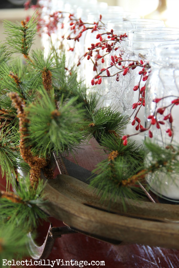 Snowy mason jar candles - love them on this old sled kellyelko.com