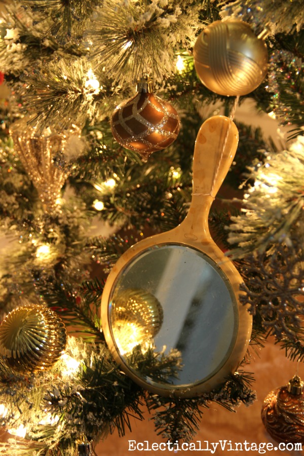 Love the vintage hand mirror ornaments on this metallic tree kellyelko.com